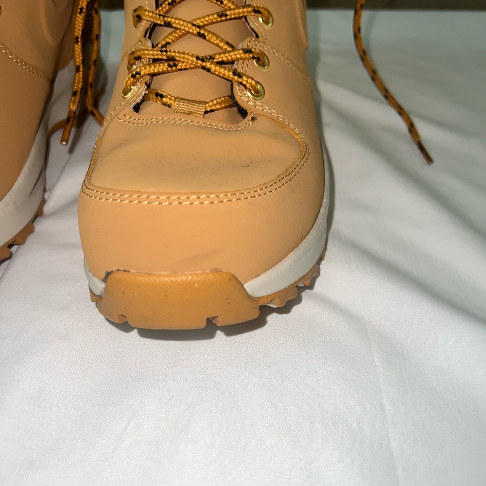 Gently Used Nike Men’s Boots.